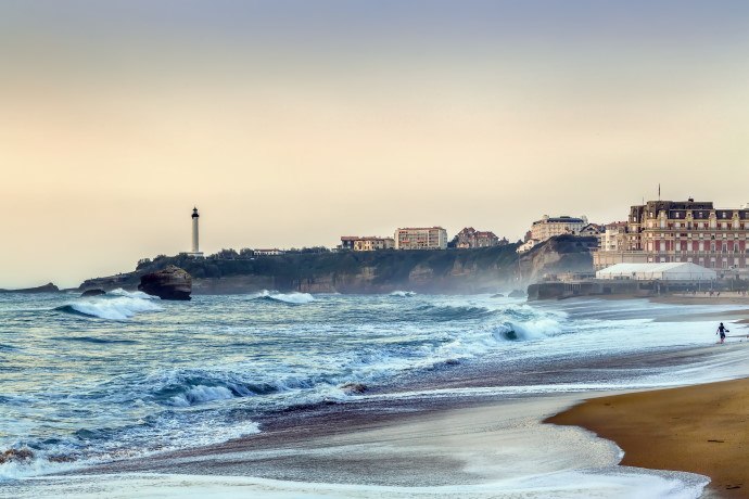 Waves on the Bay of Biscay in Biarritz in sunset, France
